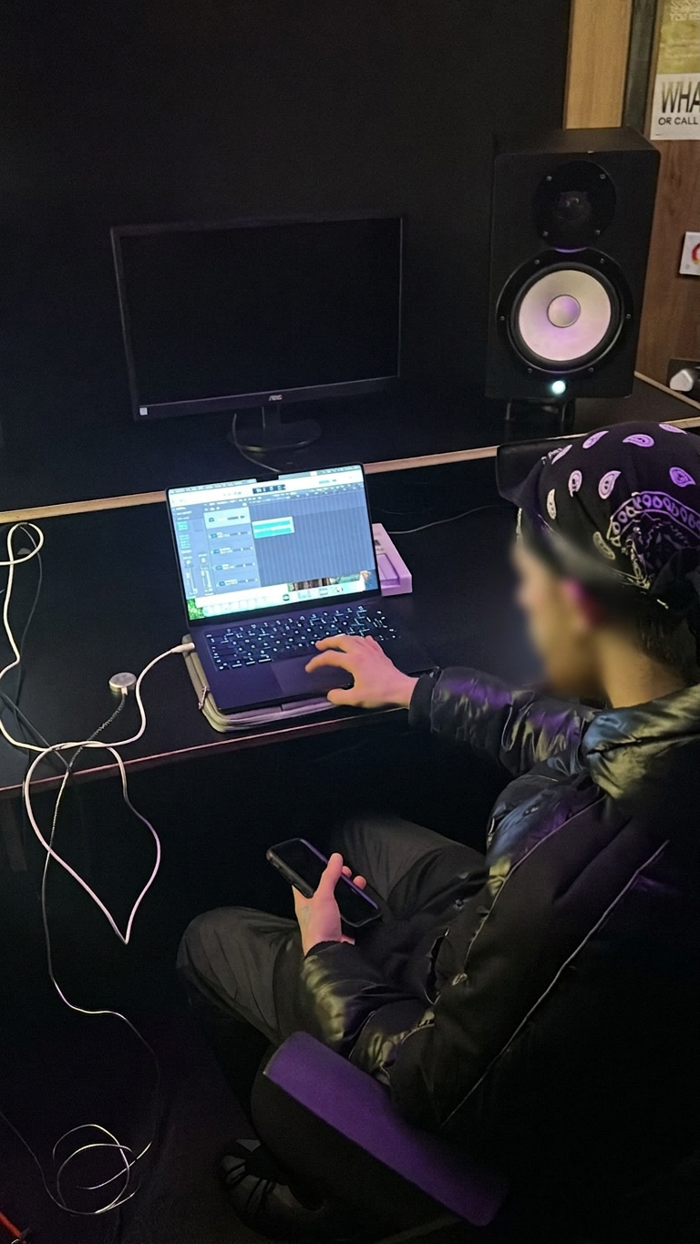A producer working in Logic Pro at the Studio Solutions desk